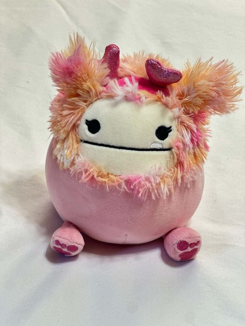 Squishmallows Caparinne The Bigfoot Pink Plush with Glitter Heart Headband